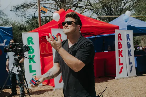 Chandler juggling at a Rebrickulous event